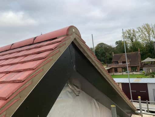 This is a photo of a gable end roof that has been repaired in Hawkhurst, Kent. Works carried out by Hawkhurst Roofing